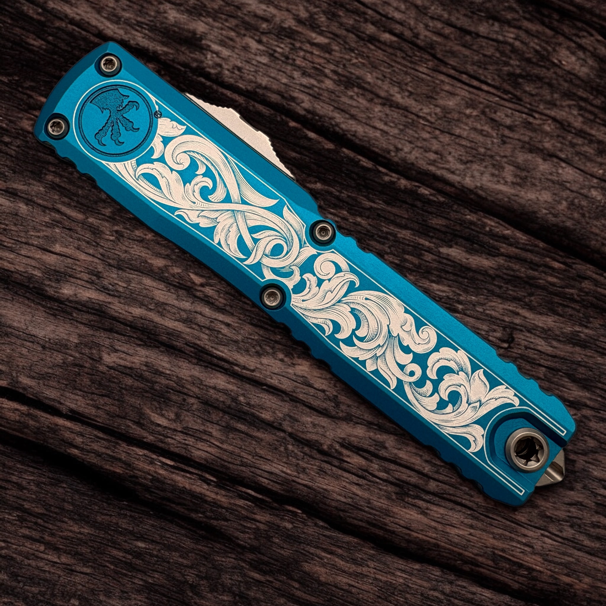 Microtech Ultratech - Blue Anodize - engraved scrolls - Front - Left Angle