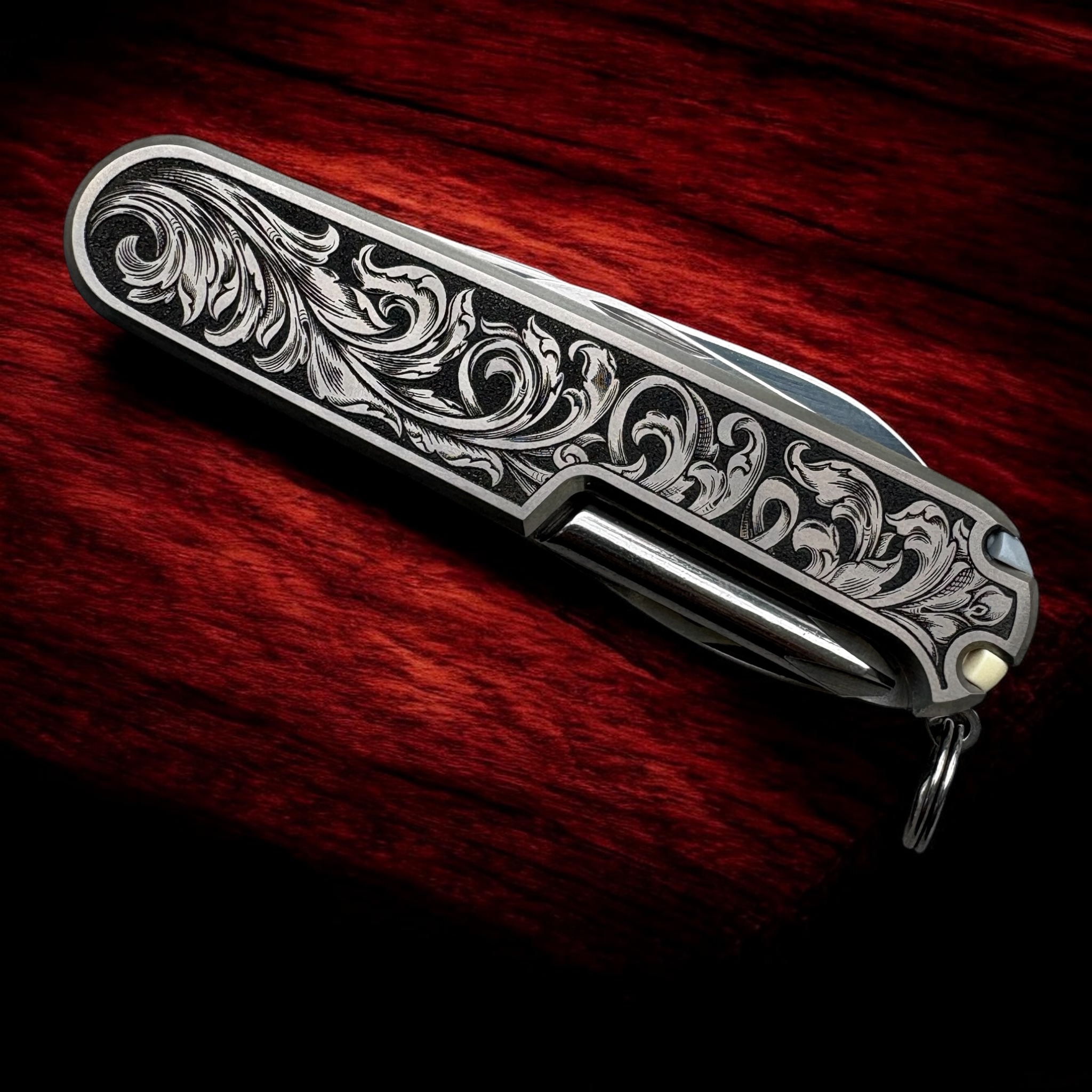 Victorinox Tinker Plus Swiss Army Knife with engraved Titanium Scales - Front