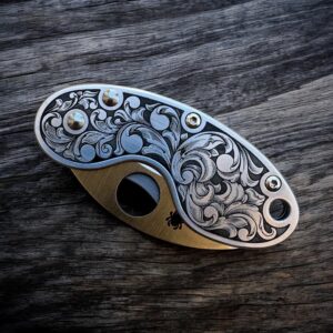 Spyderco Cricket with laser engraved scrollwork - Left Angle